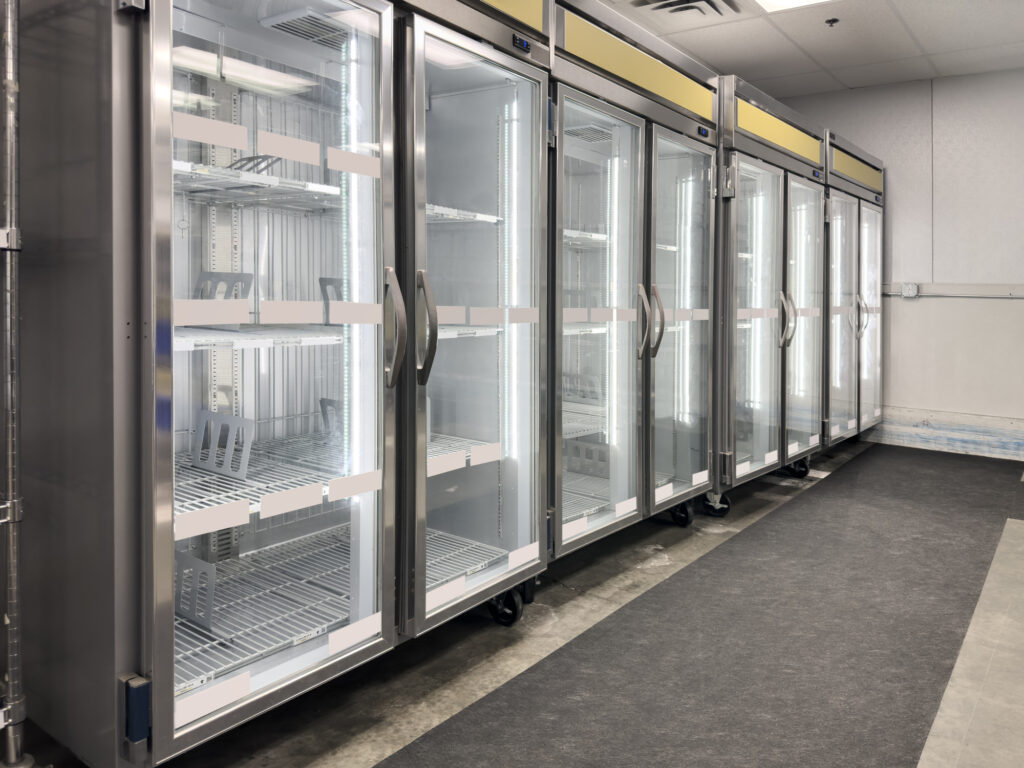 Empty fridges in a supermarket retail display